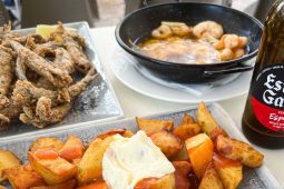 A selection of classic Spanish tapas including patatas bravas, croquetas and gambas al ajillo — the Tapas Hunters Starter Pack